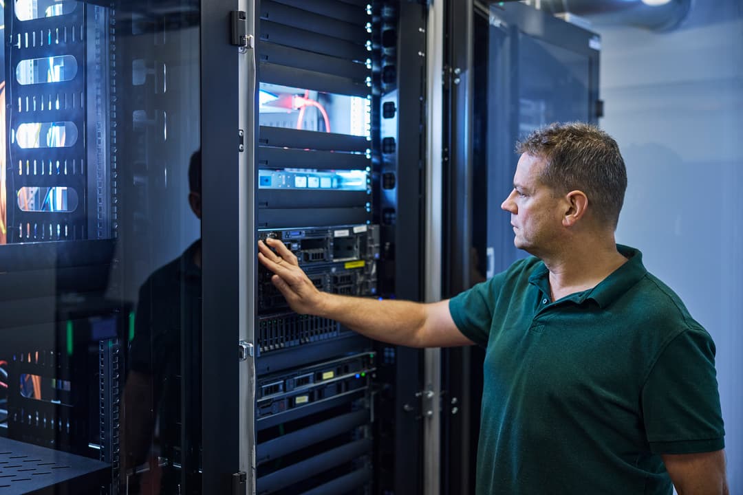 researcher working in server room
